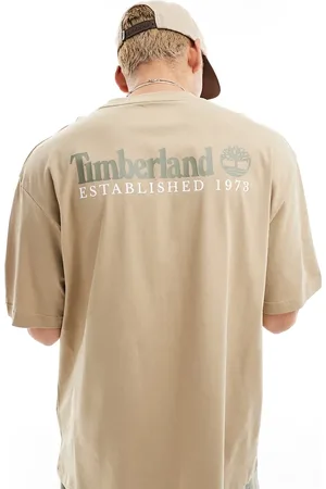 Timberland Large script logo back print oversized t-shirt in beige Exclusive to Asos