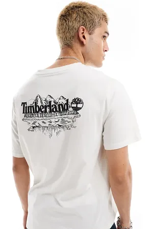 Timberland Large mountain back print oversized t-shirt in off Exclusive to Asos