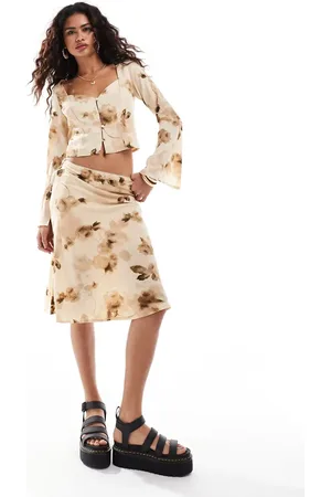 Kiss The Sky Retro flower print midi skirt in