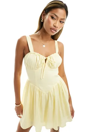 Kaiia Milkmaid tie front mini dress in