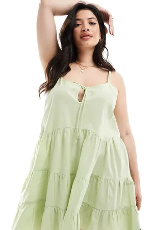 COLLUSION Plus cotton linen tiered dress with bunny tie and ring detail in sage