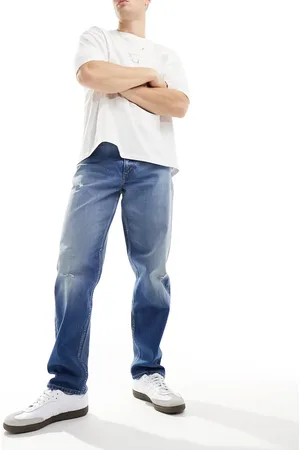 Lee Oscar relaxed tapered fit distressed jeans in mid vintage wash
