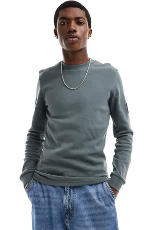 Calvin Klein Waffle badge long sleeve t-shirt in charcoal