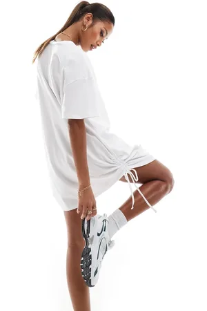 In The Style Exclusive ruched side oversized mini t-shirt dress in