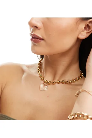 Neck On The Line Cleo plated stainless steel chain necklace with clear heart pendant