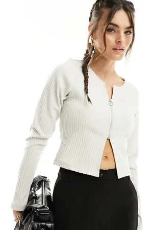 Nike Ribbed long sleeve zip through top in orewood