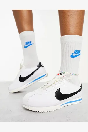 Nike Cortez leather unisex trainers in and black