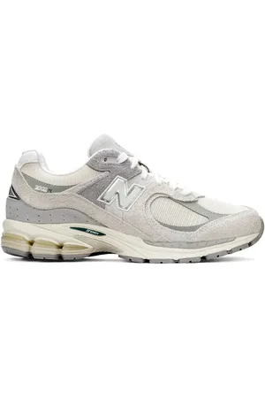 New Balance 2002 trainers in off and grey