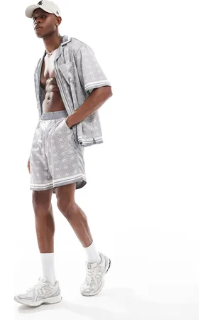 The Couture Club Co-ord emblem print shorts in