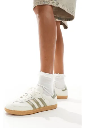 adidas Samba trainers in off and gold