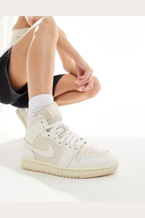 Jordan Nike Air 1 Mid trainers in off and stone