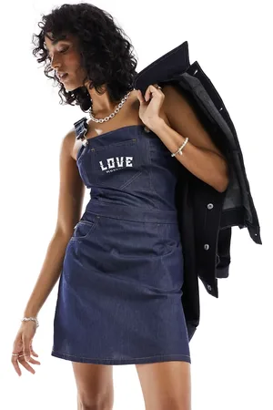 Moschino Mini denim pinafore in dark blue