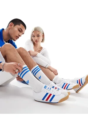 adidas K 74 trainers in white and blue