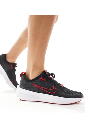 Nike Interact trainers in and red