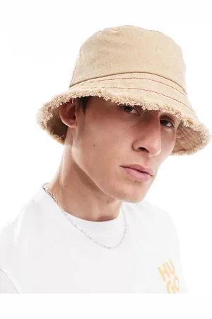 HUGO BOSS X Les Benjamins bucket hat in beige with all over print and frayed edge