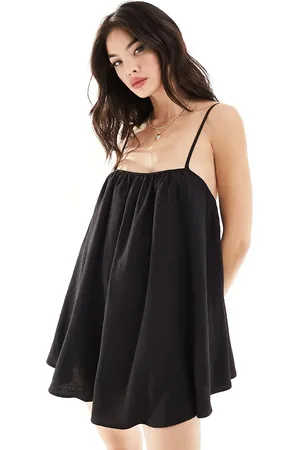 The Frolic Sunstorm easy throw on volume strappy mini beach dress in