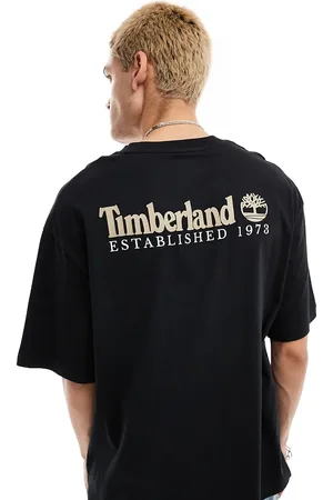Timberland Large script logo back print oversized t-shirt in black Exclusive to Asos