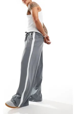 ASOS Pull on smart loose leg trousers with cut and sew side stripe in