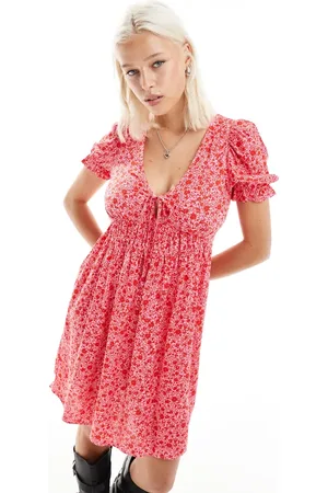 Monki Mini smock dress with puff sleeves in ditsy floral print