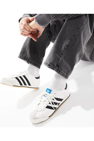adidas K 74 trainers in white and