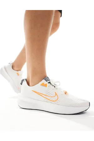 Nike Interact trainers in and orange