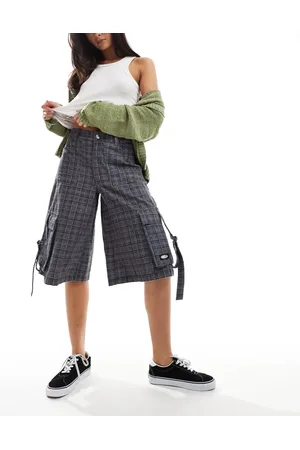 Minga London cargo longline jorts in plaid print