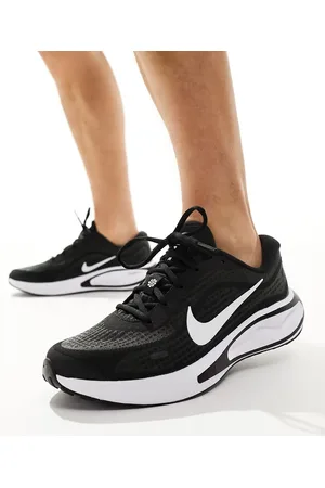 Nike Journey trainers in and white