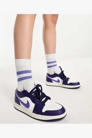Jordan Air 1 low womens trainers in action -