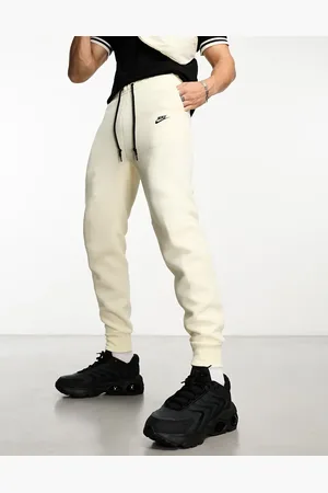 Nike Tech Fleece joggers in cream