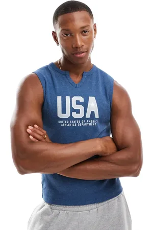 ASOS Muscle fit tank vest in blue with cut neck and USA chest print