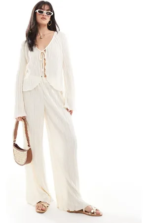 Pieces® Mix and match plisse wide leg trouser co-ord in cream