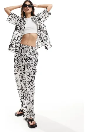 Iisla & Bird Graphic print loose fit beach trouser co-ord in white and black