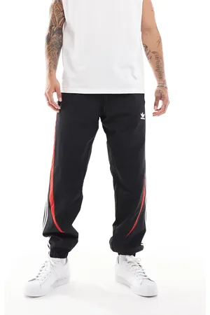 adidas Street track pants in and red