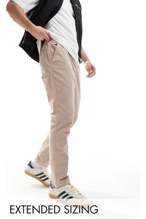 ASOS Tapered fit corduroy trouser with elasticated waist in taupe