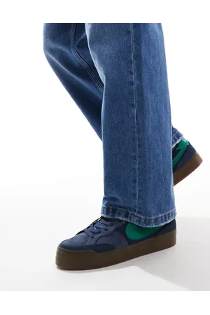 Nike Zoom Pogo Plus trainers in Navu and green