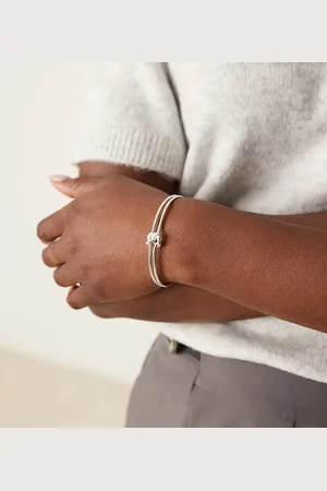 Orelia Polished interlocking knot bangle in sterling