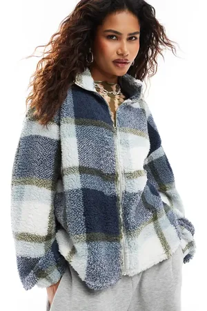 Noisy May Zip through fleece in check