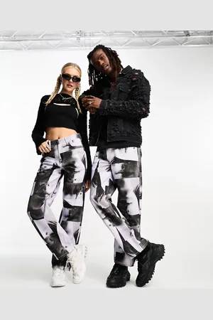 COLLUSION Unisex festival vintage printed faces baggy jean in mono