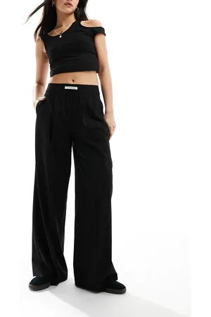 Bershka Deep waistband wide leg trousers in black