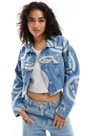 Hugo Blue Lou cropped denim jacket in midwash with all over logo print