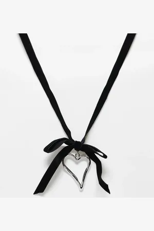 Reclaimed Heart pendant on black velvet bow
