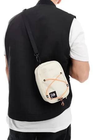 Timberland Bungee logo sling bag in off