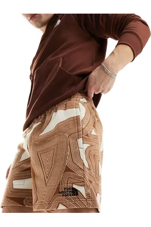 The North Face Glacier fleece shorts in geo print Exclusive at ASOS
