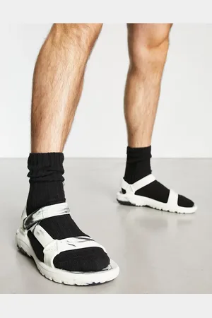 Teva Hurricane drift sandals in black marble