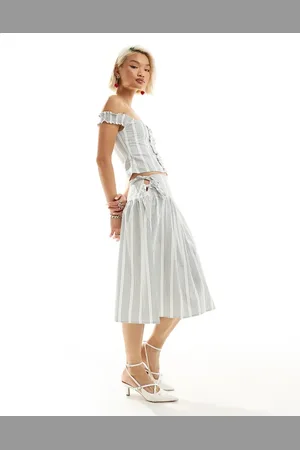 Motel Stripe tie side knee length skirt in blue