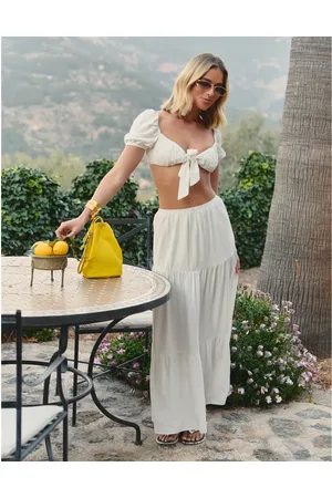 The Frolic X Lyds Butler tiered maxi beach skirt co-ord in cream linen