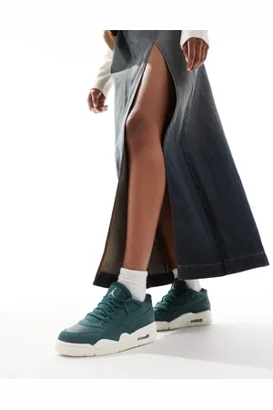 Jordan Air 4 RM trainers in off and green