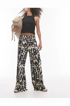 Topshop Plisse wide leg trousers in blurred animal