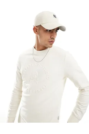 SCALPERS Skull emboss sweater in off