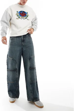 ASOS Super baggy jeans in mid wash with panels & zip details